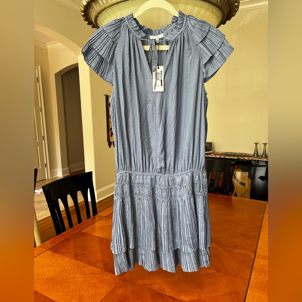 Amazing periwinkle blue pleated skirt mini dress. NWT! Size medium.